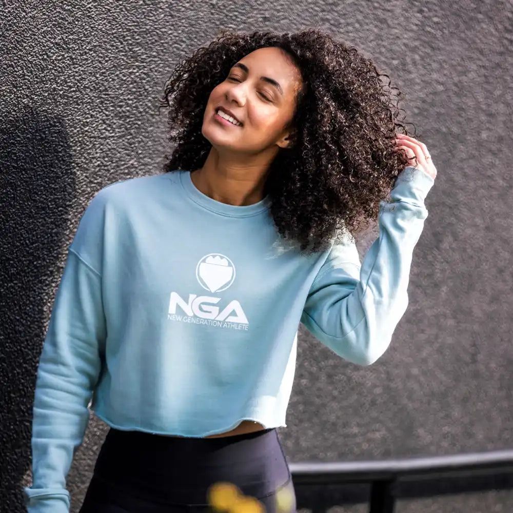 Light blue cropped sweatshirt.